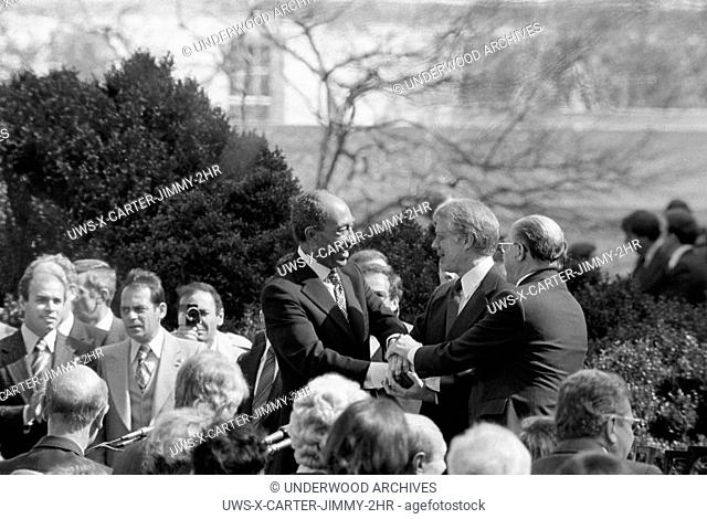 Washington, D. C. : March 26, 1979. President Jimmy Carter shaking hands with Egyptian President Anwar Sadat and Israeli Prime Minister Menachem Begin at the...