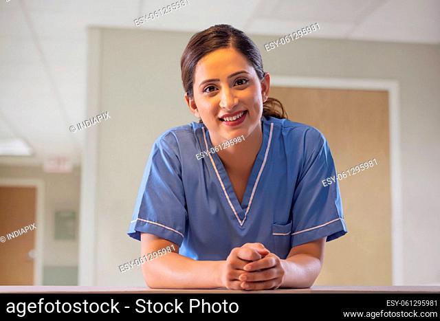 Portrait of a smiling Indian female nurse in hospital
