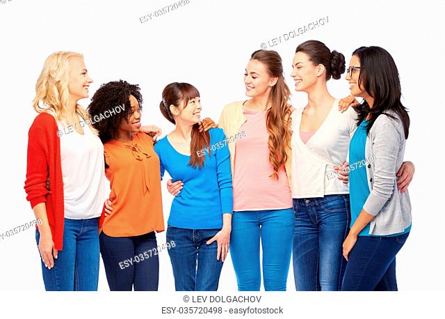 diversity, race, ethnicity and people concept - international group of happy smiling different women over white hugging