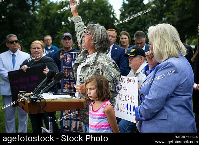 Brielle Robinson, 9, listens to her grandmother Susan Zeier offer remarks about her father, Ohio National Guardsman SFC Health Robinson