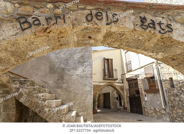 Street view, ancient houses, arch sign in catalan language Barri dels Gats, neighborhood cats, Piera, province Barcelona, Catalonia, Spain