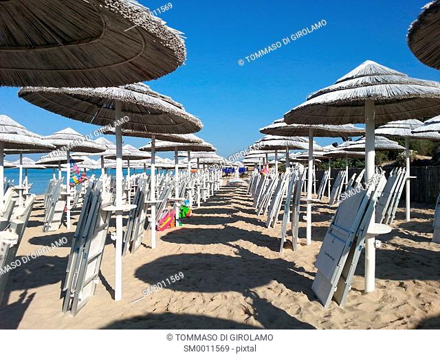 Italy, Salento, Apulia, porto cesareo, Lapillo locality, beach, Umbrellas