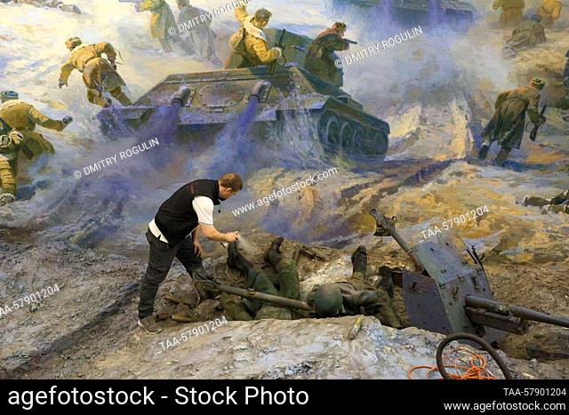 RUSSIA, VOLGOGRAD - MARCH 15, 2023: A fine art restorer of the Grekov Studio of War Artists carries out restoration work at the Battle of Stalingrad...