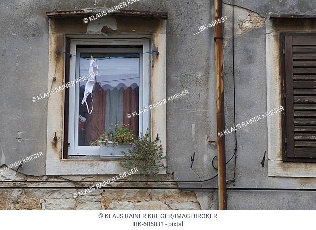 Window with bra, Vodnjan, Croatia