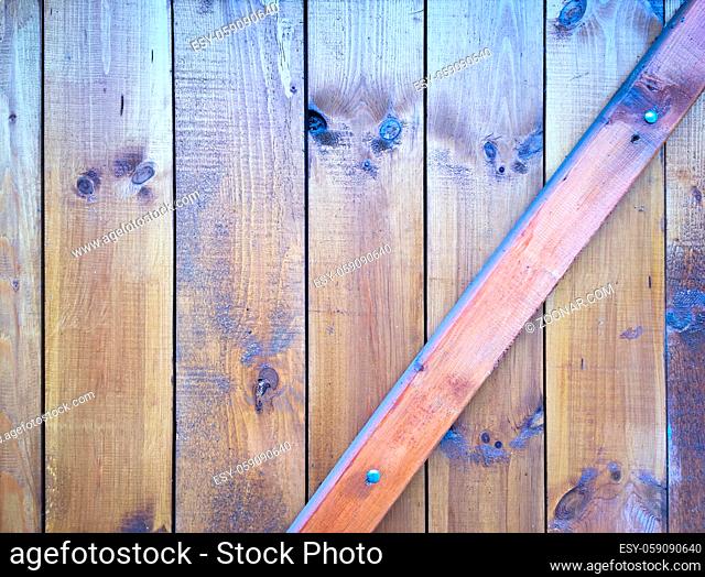 Light soft wood surface as background, wood texture. Grunge washed wood planks table pattern top view