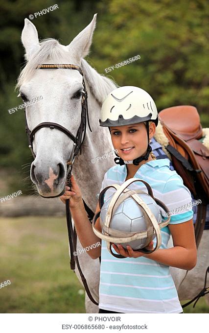 Blond girl with horse