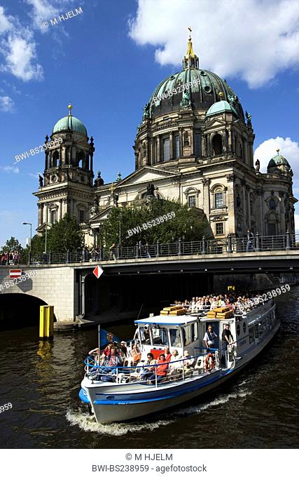 tourist ship on Spree river at Berlin cathedral, Berliner Dom, Germany, Berlin