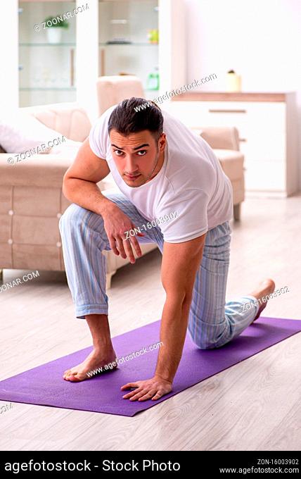 Man starting day with morning exercises