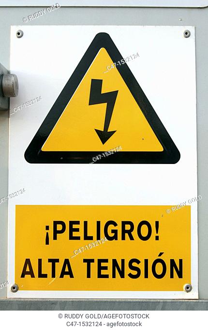 Spain, Catalonia, Lleida province, Tarres, electric shock warning on a Windmill entrance door at Pla del Cintet