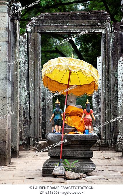 Buddha statue at the entrance of Bayon temple in Angkor Cambodia
