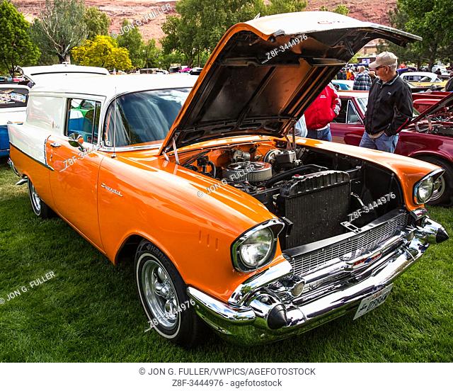 A modified 1957 Chevrolet Delivery Wagon called the Cream Sicle with a custom orange and white paint scheme in the Moab April Action Car Show in Moab, Utah