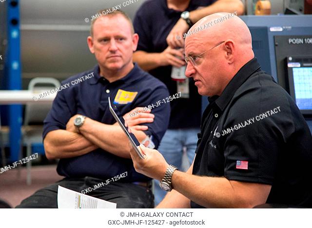 NASA astronaut Barry Wilmore (left), Expedition 41 flight engineer and Expedition 42 commander; and NASA astronaut Scott Kelly, Expedition 43 flight engineer