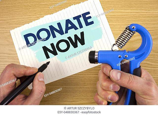 Conceptual hand writing showing Donate Now. Business photo showcasing Give something to charity Be an organ donor Help others