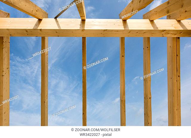 framework of new built roof on residential house in construction