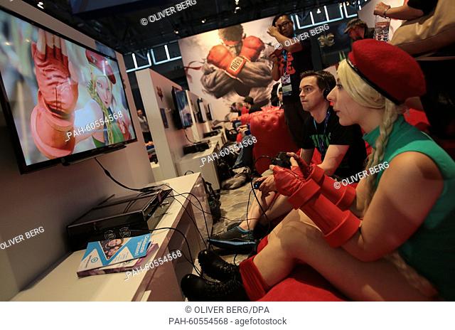 A visitor plays a game on the Sony Playstation at the computer and video games fair Gamescom in Cologne, Germany, 05 August 2015
