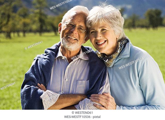 Austria, Karwendel, Ahornboden, Senior couple, smiling, portrait