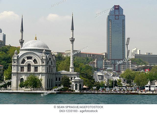 TURKEY. Contrasting architecture along the Bosphorus, Istanbul. Ortakoy mosque in foreground, on the Bosphorus