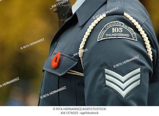 Shoulder close-up of a Royal Canadian Air Cadet  He has a poppy flower in his uniform