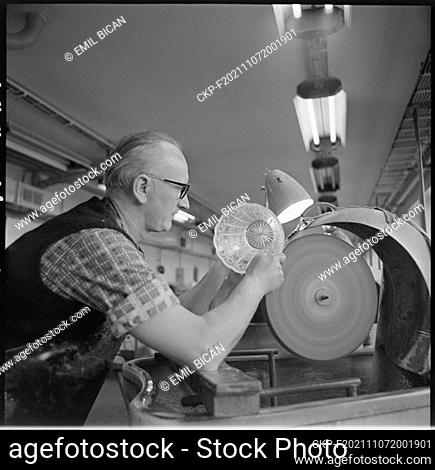 ***DECEMBER 28, 1972, FILE PHOTO***Glass cutter works on patterns and designs on a glass bowl with rich decoration in Bohemia Glassworks in Brodce in the Trebic...