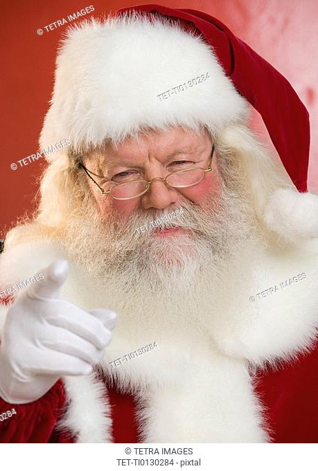 Portrait of Santa Claus pointing