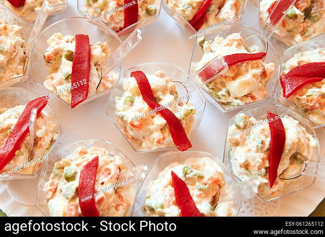 Typical Spanish tapa of Russian salad with red pepper