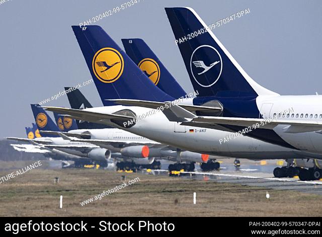 02 April 2020, Hessen, Frankfurt/Main: Decommissioned Lufthansa aircraft stand on the northwest runway of Frankfurt Airport