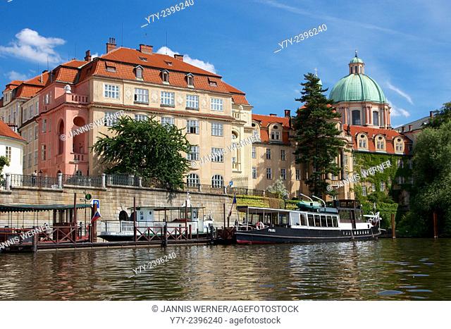 Historic buildings on the Vltava river in Prague, Czech Republic
