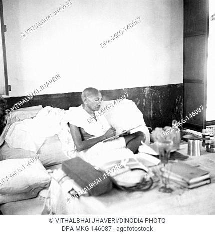 Mahatma Gandhi writing , 1939 , India NO MR