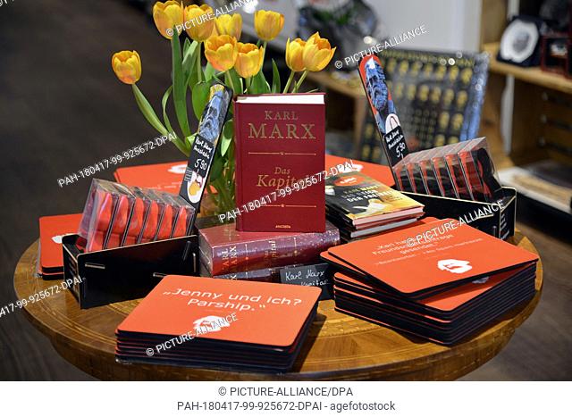 10 April 2018, Trier, Germany: Articles from Karl Marx's Capital to nouse pads are for sale in the ""Trier Souvenir"" shop