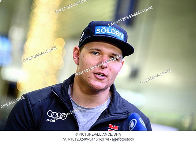 02 December 2018, Bavaria, München: Ski racer Thomas Dreßen makes a press statement on his arrival at the airport after his heavy fall on the descent to Beaver...
