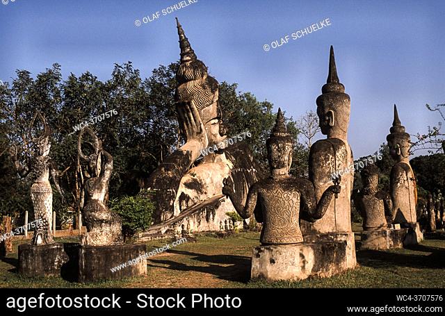 Vientiane, Laos, Asia - Buddhist and Hindu statues at the Buddha Park, also known as the Xieng Khuan sculpture park, located 25 km southeast from the capital...