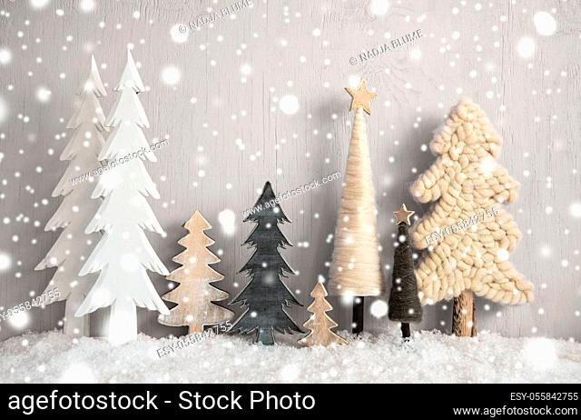 Vintage Christmas Trees. Gray Grungy Wooden Rustic Background With Snow And Snowflakes. Christmas Decoration With Stars