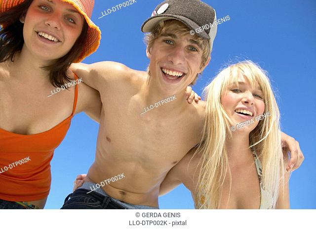 Three Teens with Arms Around each Other Smiling  Cape Town, Western Cape Province, &13, &10, &13, &10, South Africa