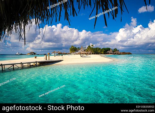 a Maldives tropical island and turquoise water. Suitable for an idea of vacations, Caribbean or tropical summer time