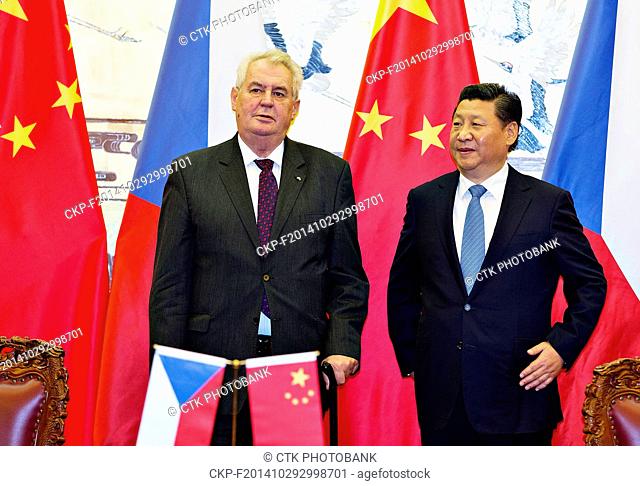 Czech Republic's President Milos Zeman, left, talks with Chinese President Xi Jinping during a signing ceremony at the Great Hall of the People in Beijing