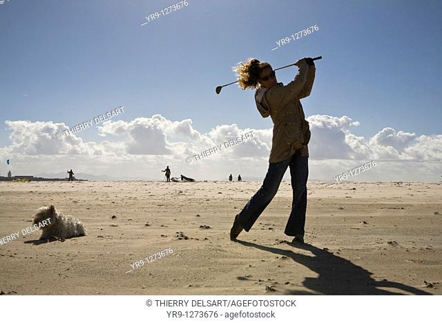 Golf training doesn't have to be on a green. An uncrowded beach in winter is actually a perfect place to do it. It even has its special appeal for its weirdness
