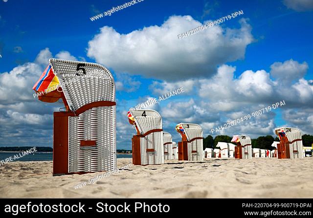 04 July 2022, Schleswig-Holstein, Sierksdorf: Beach chairs stand on the Baltic Sea beach. Schleswig-Holstein and Mecklenburg-Western Pomerania have started...