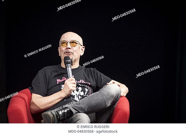 The singer-songwriter Enrico Ruggeri and the Decibel being interviewed by the journalist Gianni Poglio for the event Panorama d'Italia. Pavia, Italy
