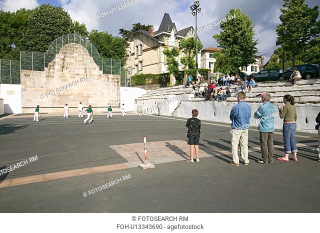 Local villagers in Sare, France, in Basque Country on the Spanish-French border, watch Jai Li game near St. Jean de Luz, on the Cote Basque, South West France