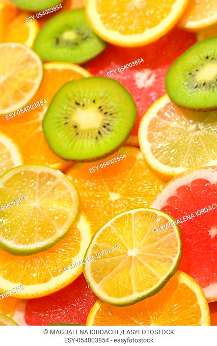 Fruit Slices Background With Lemon, Kiwi, Orange, Tangerine