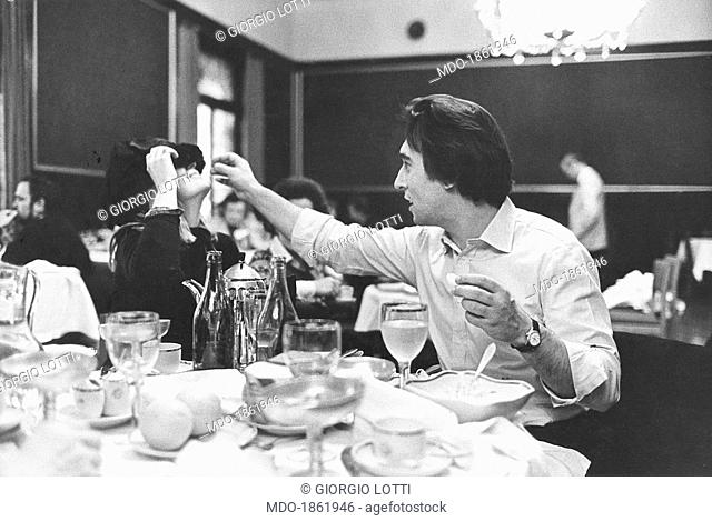 Italian conductor Claudio Abbado joking with his wife Gabriella Cantalupi at the restaurant of the Metropol hotel. Moscow, 1974