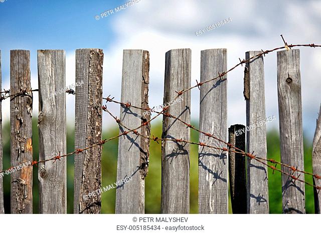 Fence With Barbed Wire
