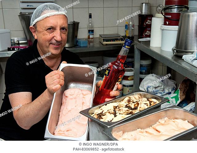 The ice-cream-maker Marco Lestam from Italy presents specialty flavours in the kitchen of his ice-cream cafe 'Bellissima' in Bremen, Germany, 11 August 2016