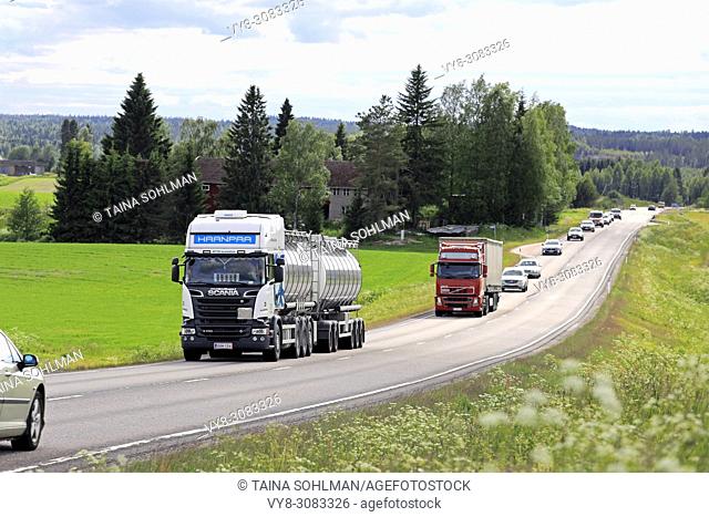 Road landscape of Highway 9 in summer with truck and car traffic. Jamsa, Finland - June 14, 2018