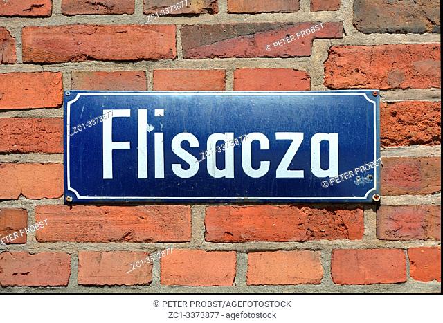 Street sign of the street Flisacza in Torun - Poland