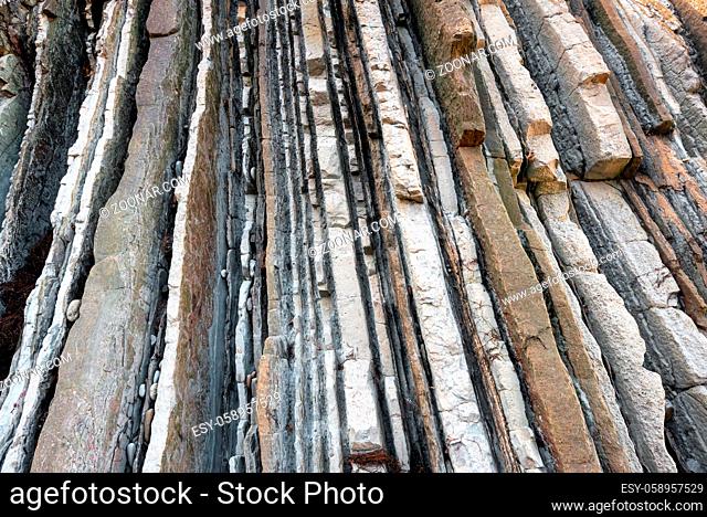 Rock strata, geological texture background detail in Zumaia, Basque Country, Spain