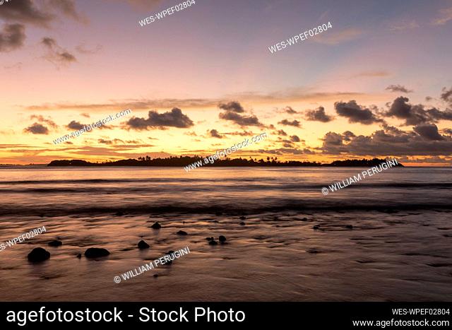 Beautiful sunset with clouds and reflections on the water, Male, Maldives