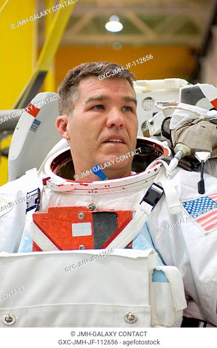 Attired in a training version of the Extravehicular Mobility Unit (EMU) spacesuit, astronaut Stephen G. Bowen, STS-126 mission specialist