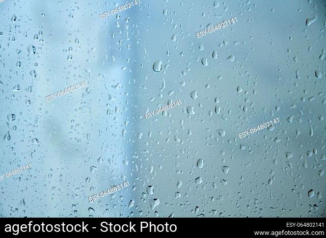 Rain drops on a window. Abstract background wallpaper