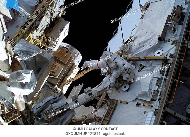 Astronaut Peggy A. Whitson, Expedition 16 commander, participates in a session of extravehicular activity (EVA) as maintenance and construction continue on the...